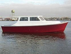 Red and white custom Evans hull on the water