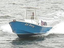 Lil Davey — blue center console running at speed on open water